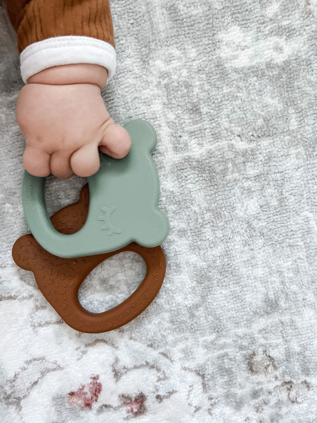 Our silicone bear teething ring in chocolate brown